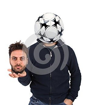 Young man with a soccer ball instead of the head