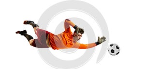 Young man, soccer football goalkeeper catches ball in jump isolated over white background. Concept of sport, action