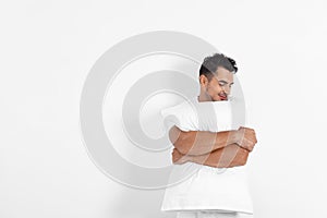Young man with soft pillow