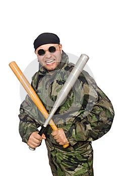 Young man in soldier uniform holding bludgeon