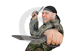 Young man in soldier uniform holding knife