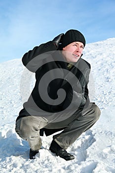 Young man of squatting remedies cap