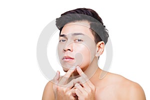 young man Squeezing pimple