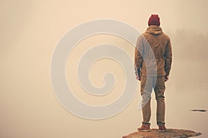 Young Man standing alone outdoor