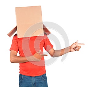 Young man standing and gesturing with a cardboard box on his head in uniform