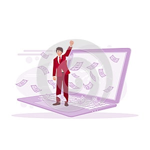 Young man standing on laptop. Earn a lot of money from laptops. Earning Money concept.