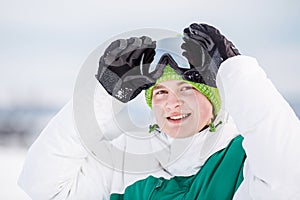 Young man standng on the snow