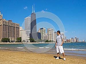 Young man staring at the Chicago Skyline