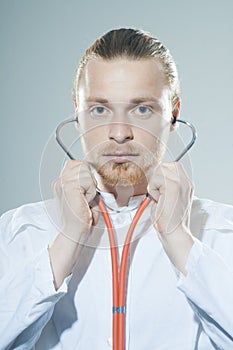 Young man with stethoscope