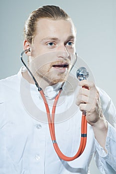 Young man with stethoscope