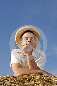 Young man with straw hat