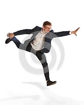 Young man, student, businessman running isolated over white background. Concept of business, office lifestyle, success