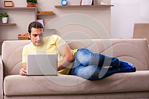 Young man student freelancer in teleworking concept