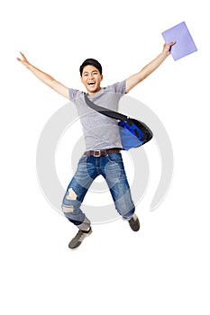 Young man student jumping