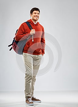 Young man or student with school bag or backpack