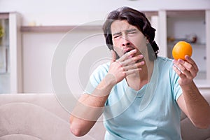 Young man suffering from allergy