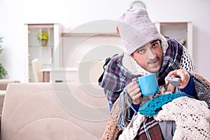 Young man suffering at home