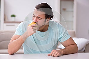 Young man suffering from toothache