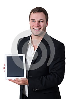 Young man in suit holding tablet pc