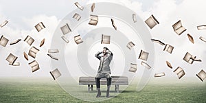 Young man in suit in park dont want to hear anything