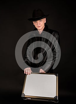 Young man with suitcase