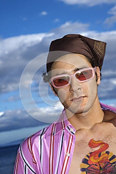 Young Man With Sunglasses and Headscarf