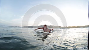 Young man with surf board