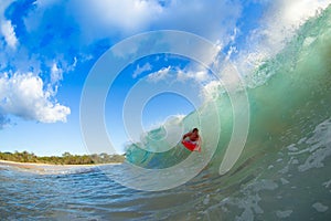 Young man surfing