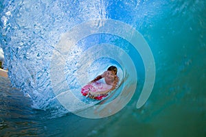 Young man surfing