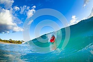 Young man surfing