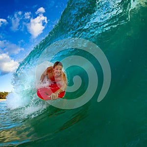 Young man surfing