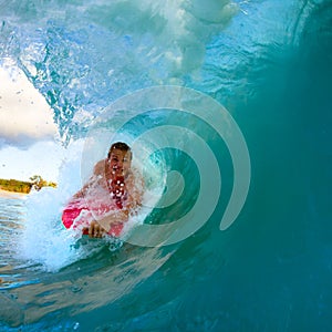 Young man surfing