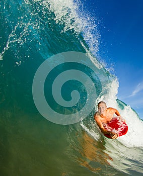 Young man surfing