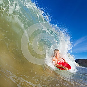Young man surfing