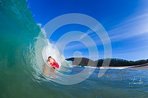 Young man surfing