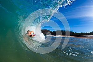 Young man surfing