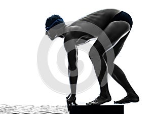 Young man swimmer swimming silhouette