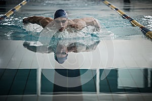 Young man in swimming pool