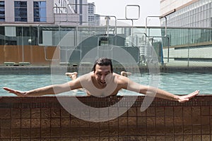 Young man at swimming pool