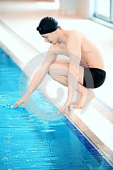 Young man in swimming pool