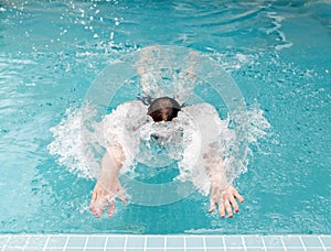 young man swims up to the termination of a path and concerns a side