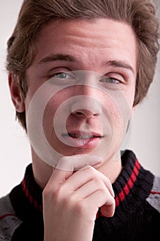 Young man with symbolic expression