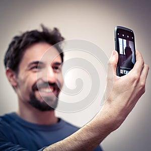 Young man take a Selfie