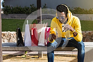Young man taking a break while is shopping