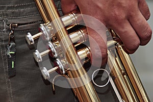 Young man with the taking his trumpet