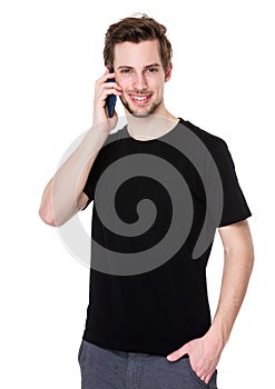 Young man talk to mobile phone