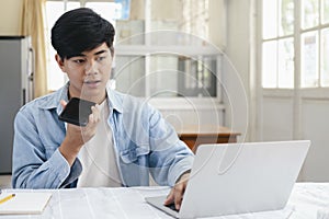 Young man talking with handfree on the phone