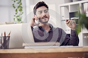 Young man talking mobile phone