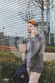 Young man talking on phone