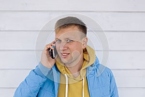 Young man talking on the phone. man using smart phone